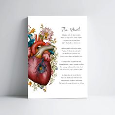 a card with an illustration of a heart and flowers on it's front side