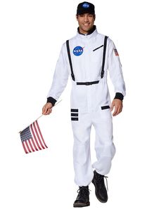 a man dressed in an astronaut costume holding the american flag