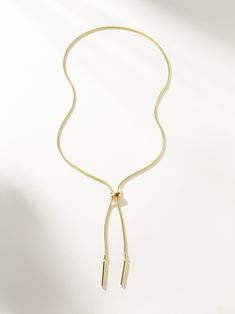 Thin Air Snake Chain Lariat Necklace in Gold | Uncommon James Lariat Necklace Layering, Lariats Jewelry, Uncommon James, Sure Thing, Gold Lariat Necklace, Gold Snake Chain, Gold Bars, Gold Snake, Gold Bar