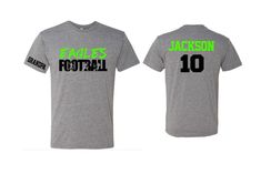 Football Dad Shirt | Short Sleeve T-shirt | Customize your team & colors PLEASE READ BEFORE ORDERING WE CANNOT RUSH ORDERS OR CREATE NEW DESIGNS DURING PEAK SEASON AUG - MAY. IF YOU NEED TO CANCEL PLEASE DO SO WITHIN 24HRS Please read full description before ordering we cannot be responsible for mistakes made by not reading the full description. ORDERING INSTRUCTIONS: 1. Select your Garment Size/Color Each size must be selected separately. Please do NOT leave a list of sizes in the notes. Th Gray T-shirt With Team Logo For Team Spirit, Athletic Heather Sports T-shirt With Team Logo, Gray Fan Apparel T-shirt For Sports Events, Short Sleeve Team Name T-shirt For Fans, Athletic Heather T-shirt With Team Name For Fans, Short Sleeve T-shirt With Team Name For Fans, Fan Gear T-shirt With Team Name And Short Sleeves, Athletic Heather T-shirt With Team Logo, Athletic Heather T-shirt For Game Day