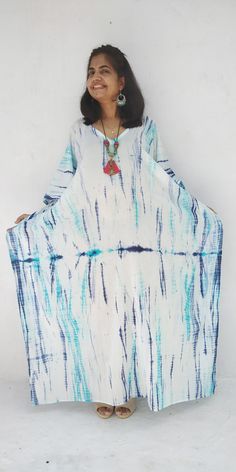 "All dresses are custommade- ONLY FOR YOU! . Indian tie- dyed kaftans robe- made to measure- all customizations happily accepted!! Long tie-dyed Kaftan, Plus size clothing, Christmas gift, Gifts for her, Beach cover up, Vacation dress, Party dress, Cocktail dress, Wedding party, Chic dress, Holiday dress , Blue dress Kaftan Tunic Maternity dress for photoshoot MESMERIZING turquoise and blue colored on white base tie-dyed RAYON CAFTAN.. and mesmerizing for the brides, party dress or beach cover u Turquoise Maxi Dress For Beach Cover-up, Tie Dye Batik Print Maxi Dress, Flowy Tie-dye Batik Print Dress, Bohemian Style Tie Dye Maxi Dress, Bohemian Tie Dye Maxi Dress, Turquoise Summer Maxi Dress For Beach, Batik Print Maxi Dress For Beach Cover-up, Long Summer Dress With Batik Print, Tie-dye Maxi Length Dress For Beach