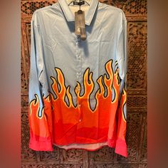 Brand New Tax Attached Romwe Flame, Long Sleeve Shirt Baby Blue Background With Orange, Red, And Yellow Flames Size Xxl Trendy Blue Printed Shirt, Orange Graphic Print Collared Tops, Casual Orange Blouse With Graphic Print, Orange Long Sleeve Printed Tops, Orange Printed Long Sleeve Tops, Blue Collared Blouse With Graphic Print, Red Graphic Print Button-up Top, Fitted Orange Printed Shirt, Orange Collared Shirt With Graphic Print