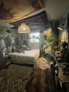 a bed room with a neatly made bed and lots of plants