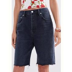 Agolde Pinch-Waist Ultra High-Rise Denim Bermuda Shorts Sitting High On The Waist, These Bermuda Shorts Make An Effortless Match For Ruffled Blouses Or Your Daintiest Printed Buttondowns. Size 28 100% Cotton Straight Fit Five-Pocket Styling Frayed Hem Button Fly Machine Wash Imported Measurements Approximate: 13" Rise 9" Inseam Waist 13" New With Tags Brand Tag Marked H0026 Fall Cutoff Bottoms In Dark Wash, Black Bottoms With Frayed Hem For Everyday, Everyday Black Bottoms With Frayed Hem, Short Jeans With Frayed Hem For Fall, Edgy Mid-rise Bottoms For Everyday, Edgy Spring Bottoms For Everyday Wear, Edgy Medium Wash Relaxed Fit Bottoms, Dark Wash High Waist Jean Shorts For Fall, Edgy Relaxed Fit Medium Wash Bottoms