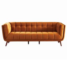 an orange couch sitting on top of a wooden frame