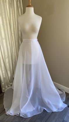 "White sheer voile/organza wedding overskirt Lots of movement with the circle skirt design and long train No seam in back so your gown will still show beautifully! Narrow waistband hooks at the side. Styling ideas in some of the pics! Wear with a topper over your after party slip dress... Waist 28\" Front length 45.5\" Back length 68\" Not your size/color? Ask about a custom order!" Prom Romper, Organza Overskirt, Bridal Overskirt, Wedding Overskirt, Wedding Dress Overskirt, Wedding Dress Topper, Dress Sites, Dress Topper, Organza Wedding