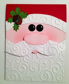 a close up of a christmas card with a santa clause on it's face