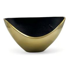 a black and gold bowl on a white background