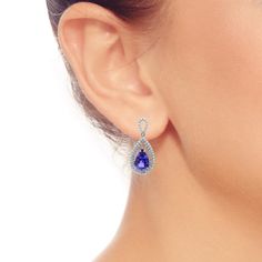 Introducing our dazzling Pear Shape Tanzanite Drop Earrings, a sublime fusion of diamonds and tanzanite in 14kt White Gold. Exuding timeless elegance and allure, these earrings are crafted to captivate any beholder. Tanzanite Drop Earrings, Brand Sale, Pear Shape, Watch Brands, Pear Shaped, Womens Watches, Timeless Elegance, Pear, Diamonds