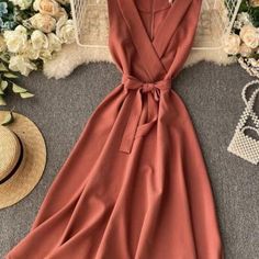 Elegant A-line V-neck Dress For Beach, Elegant A-line V-neck Beach Dress, Elegant Spring V-neck Chiffon Dress, Summer Chiffon V-neck Dress With Surplice Neckline, Chic Chiffon V-neck Midi Dress, Chic V-neck Sleeveless Dress For Date Night, Chic V-neck Solid Color Midi Dress, Summer Chiffon V-neck Maxi Dress, Summer V-neck Dress With Surplice Neckline In Solid Color