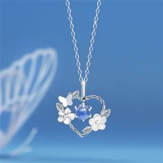 This sterling silver butterfly necklace is a beautiful twist on the classic heart necklace - with a little butterfly and flowers blooming on top! Enjoy a touch of nature with this unique piece, perfect for any outfit. Get ready to feel the love...on a twisted silver heart! Makes a beautiful gift. Your necklace comes in a gift box with a silver polishing cloth. ALL proceeds help rescued animals get the love and care they need, thank you for shopping with us! 18" Chain adjustable to 16" Heart is a Pearl Letters, Heart Shaped Pendant Necklace, Romantic Jewellery, Wedding Party Jewelry, Flower Pendant Necklace, Moonstone Necklace, Girls Jewelry, Valentin Nap, Design Floral