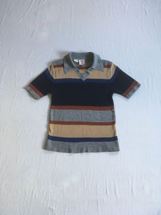 vintage 1970s knit shirt sweater  Alfie California synthetic knit striped short sleeve v neck collared grey, blue, brown, black good vintage condition, light wear- light pilling-see photos no label size fits most like S/M-see below measures, lying flat, shoulder-15 1/2" chest-16" and stretches to 19" sleeve-9" length-23 1/2" California Sweater, Diesel Clothing, Striped Pullover, Striped Short, Knit Shirt, Striped Shorts, Label Sizes, Vintage 1970s, Vintage 70s