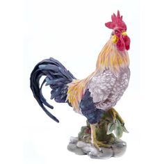 a rooster figurine is shown on a white background with the image in full color