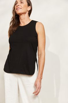 STYLE DETAILS: The Verano Tank is all about comfort and versatility, crafted with soft and stretchy cotton. Its sleeveless design and relaxed silhouette make it ideal for standalone wear or layering to elevate an outfit. With its adaptable style, the Verano Tank pairs effortlessly with jeans for a casual vibe or tucked into a maxi skirt or wide-leg trousers for a more polished look. FEATURES: Round neck Sleeveless Curved hem with side vents Hip-length Loose fit 100% Cotton XS, S, M, L, XL Effortless Cotton Tank Top For Everyday, Effortless Everyday Cotton Tank Top, Versatile Cotton Tank Top For Loungewear, Effortless Cotton Tank Top, Relaxed Cotton Tank Top For Layering, Relaxed Fit Cotton Tank Top For Layering, Effortless Sleeveless Cotton Top, Versatile Stretch Cotton Tank Top, Versatile Sleeveless Cotton Top