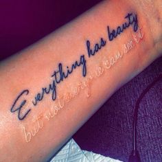 a tattoo saying everything has beauty on it