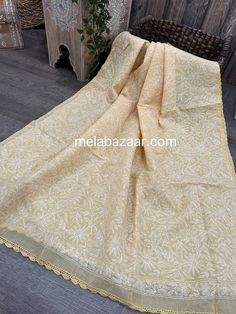 "Full size cotton dupatta with \"tepchi\" hand embroidery and crochet lace." Yellow Chanderi Dupatta With Embroidered Border, Unstitched Cotton Saree With Chikankari Embroidery, Chikankari Embroidery Cambric Saree, Chikankari Embroidered Cambric Saree, Cambric Saree With Chikankari Embroidery, Cream Cotton Kurta With Embroidered Border, Cream Cotton Anarkali Dupatta, Anarkali Cotton Dupatta In Cream, Cotton Dupatta For Wedding