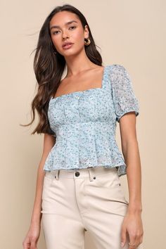 Springtime afternoons were made for an adorable top like the Lulus Dainty Effect Blue Floral Embroidered Pleated Puff Sleeve Top! Lightweight woven organza-like fabric features a charming floral print (with pierced embroidery details) as it shapes short puff sleeves with elastic at the cuffs. Square neckline tops an empire-waisted bodice with a peplum-inspired pleated hem. Hidden zipper at side. Fit: This garment runs small - please size up. Length: Size medium measures 19.25" from shoulder to h Spring Tops With Floral Print And Puff Sleeves, Feminine Puff Sleeve Tops With Floral Print, Cute Fitted Blouse For Brunch, Blue Ruffled Square Neck Top, Spring Square Neck Printed Tops, Trendy Floral Print Puff Sleeve Tops, Light Blue Puff Sleeve Casual Top, Feminine Square Neck Top For Brunch, Light Blue Casual Puff Sleeve Tops