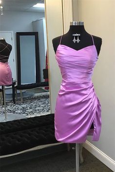 This dress is expertly crafted with a satin material and features a beautiful Lilac color. Its Bodycon silhouette and corset bodice with spaghetti straps are designed to accentuate your curves. The ruched details add a touch of elegance, while the built-in bra ensures a comfortable fit. The lace-up back adds a touch of Prom Dresses Purple Short, Light Purple Dress Short Hoco, Lilac Homecoming Dresses, Homecoming Purple Dress, Purple Dresses Hoco, Violet Hoco Dress, Hoco Dresses Tight Purple, Tangled Themed Hoco Dress, Prom Corset Dress With Pleated Bodice And Spaghetti Straps