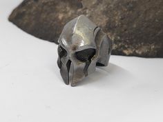 Spartan warrior masks ring, helmet ring, open finger ring man accessories Hiphop, Punk, Retro, party jewelry , jewellery gifts, Nordic viking ring for man  antique, adjustable ring , beautiful friendship gift  Thank you for visiting my shop. May you also like: CRYSTAL NECKLACES: https://www.etsy.com/shop/DinasCraftsGalerie?ref=seller-platform-mcnav§ion_id=34688097 MACRAME BRACELETS: https://www.etsy.com/shop/DinasCraftsGalerie?ref=seller-platform-mcnav§ion_id=35441023 BACK TO SHOP:  https://www. Helmet Ring, Hiphop Party, Beautiful Friendship, Viking Helmet, Nordic Vikings, Spartan Warrior, Ring Man, Viking Ring, Jewellery Gifts