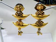 Ethnic tribal old 22 k gold Dangle earrings pair. One of type collection pair in very good condition. Length-4.5 cm, width-3 cm, weight-15.500 grams, Note-pieces may have little wax inside. Antique Gold Earrings For Festivals, Antique Chandbali Earrings For Festivals, Antique Gold Earrings With Latkans, Heavy Gold Traditional Danglers, Ornate Heavy Brass Earrings, Traditional Heavy Gold Danglers, Ceremonial Heavy Gold Danglers, Antique Chandbali Earrings For Ceremonial Occasions, Heavy Antique Earrings For Festive Occasions