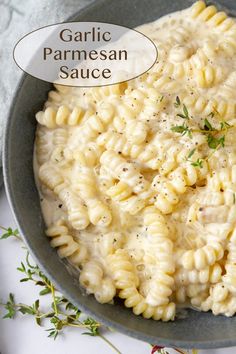 a bowl filled with macaroni and cheese on top of a table