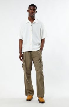 Whether you wear it for a special occasion or throw it on for a day at the skatepark, the Cream Boxy Button Down Shirt from PacSun is fashion-forward and can easily pair with the sick pieces in your closet. This button-down features a collared neckline, short sleeves, soft fabric, and a flattering fit. 


	Relaxed fit
	Short sleeves
	Collared neckline
	Button-down front closure
	PacSun branding
	100% Cotton
	Machine washable
	Model is wearing a size medium
	Model Measurements: 6'1”  Height, 34.5” Chest, 29" Waist White Relaxed Fit Casual Camp Shirt, Beige Summer Streetwear Shirt, Summer Beige Streetwear Shirt, Summer Khaki Shirt For Streetwear, Khaki Summer Streetwear Shirt, White Casual Camp Shirt With Pockets, White Button-up Camp Shirt, White Casual Button-up Camp Shirt, White Button-up Casual Camp Shirt