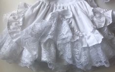 "Labeled 3Toddler, good condition ,no issues, smoke free environment/pit to pit 12\"/waist 11 1/2\"/length (shoulder to bottom) 19\"/No issues -no stains -worn very little(138)" White Cotton Dress With Attached Cancan, White Costume Dress With Attached Cancan, White Ruffled Lace Petticoat, White Lace Ruffled Petticoat, White Lace Petticoat With Ruffles, Bubble Clothes, Dress Baby Girl, Vintage Girls Dresses