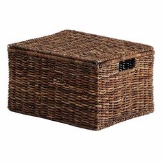 an empty wicker basket with handles on the top is shown in front of a white background