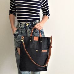 "UNISEX WAXED CANVAS TALL SLING TOTE / TALL HANDHELD BAG IN GRAY PRODUCT FEATURE ~ MATERIAL : WAXED CANVAS, GENUINE LEATHER AND ANTIQUE BRASS FINISHED HARDWARE ~ A Deep Front Pockets and Zipper Pocket ~ Unisex Bag ~ Magnetic Snap Closure ~ Come with detachable Vege Tan Shoulder / Crossbody Strap ---- CHOOSE YOUR FAVORITE LEATHER STRAP COLOR TO MATCH YOU BAG AMONG THE 2 COLOR LEATHER AVAILABLE IN OUR STOCK ----- COLORS AVAILABLE : BLACK / LIGHT GRAY / DARK RED / DARK BLUE / ARMY GREEN / CAMEL / G Everyday Waxed Canvas Shoulder Bag With Top Carry Handle, Everyday Waxed Canvas Shoulder Bag With Top Handle, Black Canvas Bag With Leather Handles For On-the-go, Functional Black Canvas Bag With Leather Handles, Black Tote Satchel For Daily Life, Waxed Canvas Tote Shoulder Bag With Top Handle, Canvas Pouch Bag For Everyday Use, Canvas Bag With Adjustable Strap For Daily Life, Daily Canvas Bag With Adjustable Strap