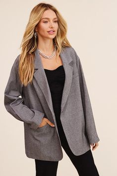 This blazer redefines elegance with its oversized silhouette that effortlessly bridges comfort and style. The welt pocket on the right front adds a touch of functionality and charm. The long sleeves offer versatility for various occasions, making it suitable for both formal and casual settings. With a clean and minimalistic design, the one-button closure provides a polished finish that complements the overall aesthetic. - Model is 5' 9" 33-24-34 and wearing a size Small Style: Casual Print / Pat Solid Long Sleeve Blazer For Office, Classic Single-breasted Long Sleeve Blazer Dress, Classic Long Sleeve Single Breasted Blazer Dress, Long Sleeve Classic Blazer Dress For Office, Single Breasted Long Sleeve Blazer Dress For Business Casual, Classic Long Sleeve Blazer Dress For Work, Single-breasted Long Sleeve Blazer Dress For Business Casual, Fall Business Blazer With Notched Lapel, Notched Blazer For Business Casual In Fall