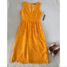 Gianni Bini Debi Lace Midi Dress Size 4 Beautiful All Over Lace Design Yellow Gold Color V-Neck Sleeveless Back Zipper Closure Fully Lined Nwt This Dress Is So Gorgeous And Definitely Eye Catching In The Sunlight. I Bought It New But Didn’t Realize It Was In The Wrong Size *Tear* *Smoke Free Home Elegant Yellow Sleeveless Dress For Vacation, Chic Yellow Knee-length Sleeveless Dress, Elegant Yellow Midi Dress For Beach, Yellow Sleeveless Sundress For Party, Yellow V-neck Midi Dress For Party, Elegant Yellow Sleeveless Maxi Dress, Elegant Sleeveless Yellow Midi Dress, Mustard Sleeveless Sundress, Yellow Sleeveless Dresses For Brunch