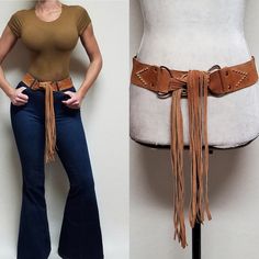 70s Vintage Caramel Suede Leather Brass Gold Studded Fringe Tassle Belt. Perfect With Any Bohemian Outfit, This Vintage 1970s Wide Fringe Belt, No Brand, Will Be A Staple In Your Wardrobe! - Would Look Amazing With The 60s Vintage Multi-Color Patchwork Rabbit Fur Coat - Caramel Colored Suede Leather, Light Wear From Age - Brass Buckles - Gold Studded Arrows - Super Long Bold Fringe Tassles, Fringe Ties - Wide Belt But Fits Through Most Belt Loops Osfa, One Size Fits All Approximate Measurements: Length (Buckle To Buckle, Without The Buckles) - 26.5 Inches Length (Fringe To Fringe) - 68.5 Inches Width - 2 Inches Vintage Retro Boho Bohemian Vintage Belt Beaded Belt Metal Belt 1970s Groovy F Patchwork Rabbit, Wide Fringe, Bohemian Outfit, Fringe Belt, Cowgirl Belts, Festival Belt, Rabbit Fur Coat, Fringed Belt, Cowboy Belt