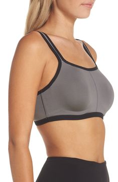 Designed with a hidden underwire and light foam cups, a convertible athletic bra helps minimize movement and comfortably supports your high-impact workout. The moisture-wicking CoolMax® fabric is finished with a center seam for natural shaping. Partially lined Adjustable, convertible straps CoolMax polyester moisture-wicking fabric for dryness and comfort in the heat 85% CoolMax polyester, 15% Lycra® spandex Hand wash, dry flat Imported Contoured Sports Bra With Built-in Padding For Gym, Sporty Contoured Sports Bra With Built-in Bra, Padded Athleisure Activewear For Light Sports, Padded Athleisure Activewear For Sports, Padded Sports Bra For Running, Padded Medium Support Sports Bra For Athleisure, Sporty Activewear With Built-in Bra Full Coverage, Sporty Padded Supportive Activewear, Sporty Activewear With Removable Bra Pads For Yoga