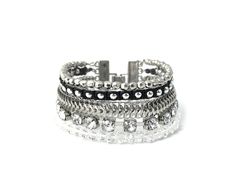 "A multistrand boho hippie style stackable bracelet in silver black tone, it is a combination of rhinestone chain, glass bead, braided string and buckle clasp. Measurement: Inner circumference approx 18.5cm after closed Materials: Metal chain, glass bead, rhinestone chain, bead braided string Metal Color: Rhodium All metal are lead and nickel free * No return or refund for this \"Made To Order\" item For more multistrand bracelets, please visit this link:- https://www.etsy.com/hk-en/shop/nloiscr Silver Beaded Bracelets With Strap For Party, Adjustable Stackable Crystal Bracelet In Metal, Bohemian Silver Chain Bracelet For Party, Adjustable Stackable Metal Crystal Bracelet, Silver Multi-strand Bracelets With Silver Beads, Bohemian Metal Beaded Stackable Bracelets, Trendy Silver Metal Braided Bracelets, Silver Bohemian Multi-strand Wrap Bracelet, Bohemian Silver Cuff Bracelet For Parties