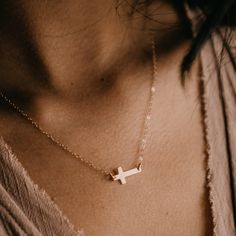 This delicate cross necklace is approximately 5/8" long and hangs sideways so it stays in place! •D E T A I L S• -Available in 14k gold filled + sterling silver -Cable chain and spring clasp included -Length of necklace includes the cross. GIVING THIS AS A GIFT? Your jewelry will arrive to you in one of our beautifully branded Mountain Feather gift boxes, perfect for gift giving! I provide one gift box for every three items purchased, if you need additional gift boxes for multiple gifts please p Dainty Cross Necklace For Everyday, Daily 14k Gold Cross Pendant Necklace, Everyday 14k Gold Cross Necklace, Everyday 14k Gold Cross Pendant Necklace, Delicate Everyday Cross Pendant Jewelry, Delicate Everyday Cross Necklace, Everyday 14k Gold Filled Cross Pendant Necklace, 14k Gold Filled Cross Necklace, Rose Gold Cross Pendant Jewelry For Everyday