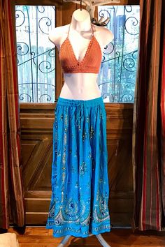 Sequined Embroidery Turquoise Gold painted Long Maxi Skirt, Bohemian Boho Chic Festival Ethnic Hippie Summer Sparkle One Size Feminine Long Skirt. Crochet or tie dye top is not included. You will feel so good in this gorgeous skirt. Beautiful Long Maxi skirt hand embroidery, hand sequined gold painted and it sparkles so each skirt is unique and one of a kind. This rayon Turquoise skirt is made using soft light and beautiful rayon fabric. Rayon was the first manufactured fiber. The term rayon was Turquoise Skirt, Skirt Outfit Summer, Hippie Summer, Skirt Crochet, Long Maxi Skirt, Festival Pants, Boho Chic Dress, Embroidery Hand, Langer Rock