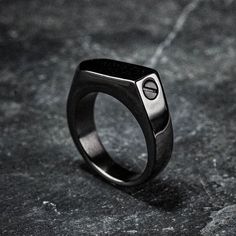 A simple but stylish way to keep your loved one with you at all times. A small quantity of ashes can be inserted into the ring by removing the screw cap to reveal a cavity below. Comes complete with the accessories needed to safely insert the ashes. Modern Everyday Durable Jewelry, Custom Black Jewelry With Hardware For Gift, Black Jewelry With Custom Hardware As Gift, Cremation Rings, Cremation Jewelry Ring, Cremation Ring, Screw Caps, Cremation Jewelry, Are You The One