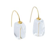 This simple White Crystal Rock earrings will bring you a sense of unexpected edge, fun, and understated sophistication, perfect for any occasion 1.25" Total Length 22K Gold Filled Sterling Silver Plate, 5mm, From Vietnam Crystal Rock 13mm x 20mm, From India 14K Gold Hook, 15mm, From US Handmade in Westport CT. US Free shipping and Free returns within 90 days of receipt 2-year warranty White Crystal, Gold Drop Earrings, 22k Gold, Hook Earrings, Baroque Pearls, Sterling Silver Bead, Gold Plated Sterling Silver, Earring Necklace, Crystal Earrings