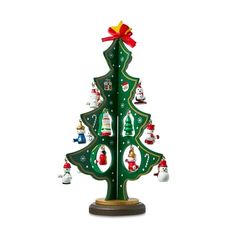 a wooden christmas tree with ornaments on it