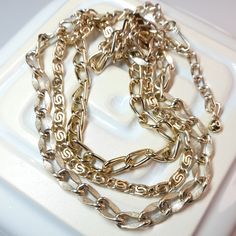 This is a beautiful gold tone multi strand cascade necklace made of a lightweight metal, which means that although it is quite dramatic, it is also very comfortable to wear.  This versatile vintage necklace is in great condition, and appears to be hardly used. Adjustable from 14" to 17" long when opened out I will gift wrap your order to make opening your vintage treat even more fun! UK orders over £30 sent by Signed For, or select Signed For at checkout Europe over EUR35 sent by Tracked or Sign Jewelry For Summer, Vintage Statement Jewelry, Cascade Necklace, Presents For Mum, Summer Gift, Multi Strand Necklace, Necklace Vintage, Strand Necklace, Vintage Jewellery