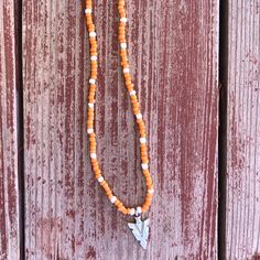 Orange & White Seed Bead Necklace With Arrowhead Charm White Beach Necklaces For Spring, White Bohemian Beaded Necklaces For Spring, White Beach Necklace For Spring, Spring Beach White Necklace, White Seed Bead Necklace, Bead Necklaces, Ring Ideas, Seed Bead Necklace, Summer Jewelry