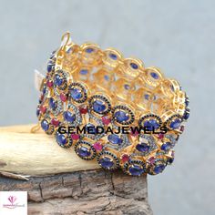 Sapphire Silver Bracelet, Pave Diamond Bracelet, Ruby Gemstone Bracelet, Gemstone 925 Silver Jewelry, Gold Vermeil Bracelet, Wedding Jewelry Gross Weight: 86.29 gram Gemstone Weight: 64.75 cts Diamond Weight: 4.02 cts Bracelet Size: 7.5 inch NOTE:- All The Products Are Designed And Manufactured In My Workshop By Me & My Team. Shown Products Are Purely Handmade. Custom Orders Are Open Handly Accepted. We Are the Perfect Choice For Any Custom Jewelry Manufacturing. For Bulk Orders Please Messa Multi-stone Round Diamond Bracelet For Anniversary, Cubic Zirconia Multi-stone Bangle, Multi-stone Cubic Zirconia Bangle, Fine Jewelry Multi-stone Bangle Bracelet, Multi-stone Diamond Bangle Bracelet Gift, Round Cubic Zirconia Bracelets With Stones, Sterling Silver Gemstone Bracelets For Weddings, Sterling Silver Cubic Zirconia Gemstone Bracelet, Oval Gemstone Bangle For Wedding