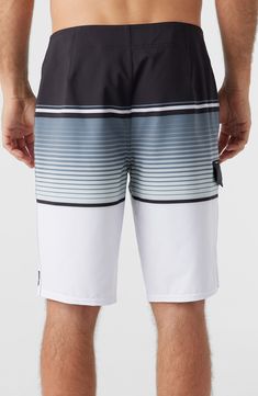 Lounge by the water in these stretchy board shorts featuring signature water-resistant tech and antirash seaming. 10" inseam; 20" leg opening (size 29) Lace-up closure Cargo flap pocket Hyperthread antirash seaming Hyperfreak stretch fabric Hyperdry durable water-resistant technology 90% polyester, 10% elastane Machine wash, tumble dry Imported White Summer Bottoms For Outdoor, White Beach Season Shorts For Outdoor, White Shorts For Beach Season Outdoor Activities, White Beachwear Swimwear For Outdoor, White Shorts For Outdoor Beach Season, White Summer Swimwear For Outdoor, White Summer Outdoor Swimwear, White Beach Season Outdoor Shorts, White Swim Trunks For Beachwear