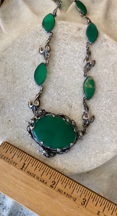 Beautiful Art Nouveau Arts n Crafts Green Chrysoprase Sterling Silver Floral Motif Antique Necklace Necklace measure Approx. 16 inches around Chain Width - Approx. 10 mm Weighs - 30 grams Green Artisan Jewelry With Oxidized Finish, Artisan Green Jewelry With Oxidized Finish, Green Oxidized Artisan Jewelry, Formal Cabochon Chrysoprase Jewelry, Oval Chrysoprase Gemstone Necklaces, Oval Chrysoprase Gemstone Necklace, Oval Chrysoprase Natural Stone Necklace, Oval Chrysoprase Necklaces With Natural Stones, Antique Green Oval Jewelry