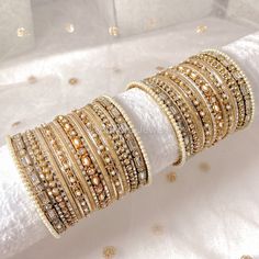 2 stacks of Mirror & sparkly golden bangles. Ready to ship as seen with small gift box. No roll. Sold as pair Golden Bangles, Golden Mirror, Head Jewelry, Bridal Bangles, Nose Jewelry, Stacked Bangles, Small Gift Boxes, Jhumka Earrings, Bangle Set