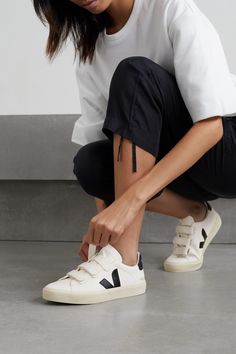 Veja's 'Recife' sneakers will ground so many outfits during any season thanks to the versatile white and black palette. Made from chrome-free leather with rubber trims, they have signature rubber soles and three Velcro®-fastening straps. Zapatillas Veja, Sneaker Outfits Women, Veja Shoes, Sneaker Outfits, Velcro Shoes, Velcro Sneakers, Veja Sneakers, Black And White Sneakers, White Sneakers Women