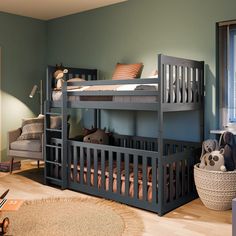 a bedroom with two bunk beds and a rug on the floor