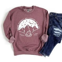 Looking for a cute versatile top to wear? Make sure to grab one of our Graphic Sweatshirts! This soft and comfortable shirt is the perfect top for any outfit. It can be paired with biker shorts, Jeans, or the classic stay at home sweats! This sweatshirt is true-to-size, so be sure to order your regular size! If you are looking for a more oversized look, make sure to size up. Casual Fall Tops For Camping, Casual Tops For Fall Camping, Graphic Print T-shirt For Fall Camping, Fall Long Sleeve Tops For Camping, Fall Camping T-shirt With Letter Print, Long Sleeve Tops For Fall Camping, Long Sleeve Cotton Top For Camping, Winter Camping Graphic Print Tops, Letter Print Top For Camping In Fall