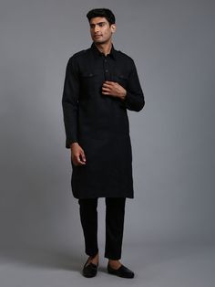 Vastramay Men's Black Pathani Suit Set Make a statement with this classic black Pathani suit set from Vastramay. Crafted from premium fabric, this suit features a comfortable fit and stylish design, perfect for special occasions and festivities. Features: Classic black color Comfortable fit Stylish design Specifications: Brand: Vastramay Color: Black Material: Premium fabric Sleeve Length: Full sleeves Material & Care: 100% Premium fabric. Dry clean only. Legal Disclaimer: The product is guarant Black Business Sets With Pockets, Black Slim Fit Long Sleeve Sets, Formal Black Cotton Kurta, Black Semi-formal Kurta For Festive Occasions, Formal Cotton Sets With Pockets, Black Slim Fit Workwear Sets, Black Slim Fit Sets For Workwear, Black Semi-formal Suits With Pockets, Tailored Black Sets With Long Sleeves