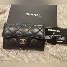 Chanel Card Wallet, Actual Photos, Not Edited Excellent Condition Color Black Silver Hardware Lambskin Leather Comes With Authenticity Card, Hologram Intact & Box Chanel Wallet, Chanel Bags, Classic Flap, Lambskin Leather, Silver Hardware, Chanel Bag, Card Wallet, Black Silver, Chanel